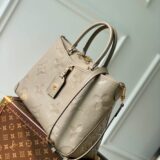 Replica Louis Vuitton beige Trianon bag in monogram empreinte leather, high-quality designer dupe with free shipping (1)