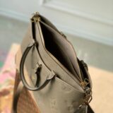 Replica Louis Vuitton beige Trianon bag in monogram empreinte leather, high-quality designer dupe with free shipping (1)