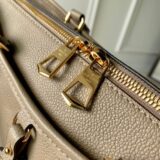 Replica Louis Vuitton beige Trianon bag in monogram empreinte leather, high-quality designer dupe with free shipping (1)